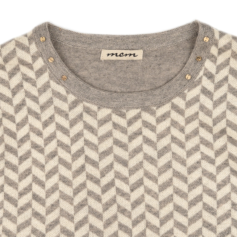 Beige sweater with patterned design and round neck featuring decorative jewelry, by MCM #24522