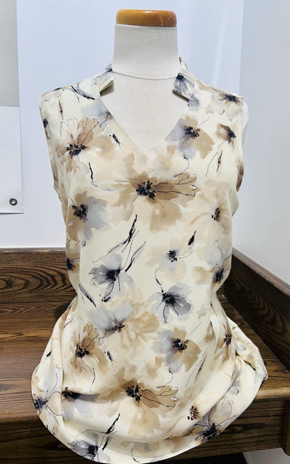 Beige sleeveless top with floral print, by Dévia #S370T