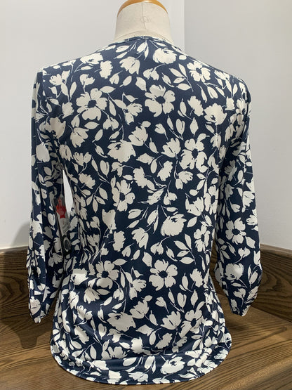 White abstract pattern V-neck top by Dévia #S408T