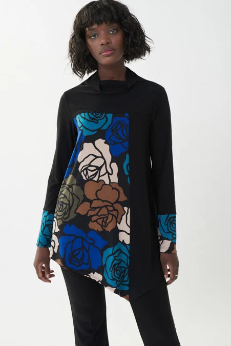 Tunique Joseph Ribkoff, qui ajoute du style a un legging, pantalon noir ou même une jupe. Style asymétrique qui sort de l ordinaire, donne du piquant a votre ensemble...le bas de ses manche est du même imprimé que dans le chandail...