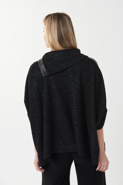 CHANDAIL AMPLE,STYLE TUNIQUE, AVEC TELLEMENT DE STYLE QUE TOUT LE MONDE VOUS DEMANDERONT OU VOUS L AVEZ ACHETÉ! AVEC SON COL A 3 BOUTONS,LE CUIR AUX ÉPAULES ET AUX BRAS,QUI SE TERMINE AUX COUDES, VOUS SEREZ CONFORTABLE EN TOUTE SAISON..FABRIQUÉ PAR JOSEPH RIBKOFF