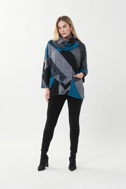 superbe chandail  imprimer dans les tons de noir,bleu sarcelle,et de gris pale...coupe décontracté. un grand col et ses belles poches avant donne un super look a ce chandail. Signé Joseph Ribkoff