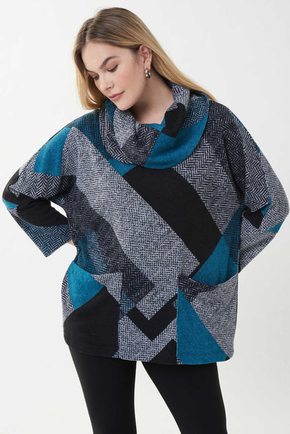superbe chandail  imprimer dans les tons de noir,bleu sarcelle,et de gris pale...coupe décontracté. un grand col et ses belles poches avant donne un super look a ce chandail. Signé Joseph Ribkoff