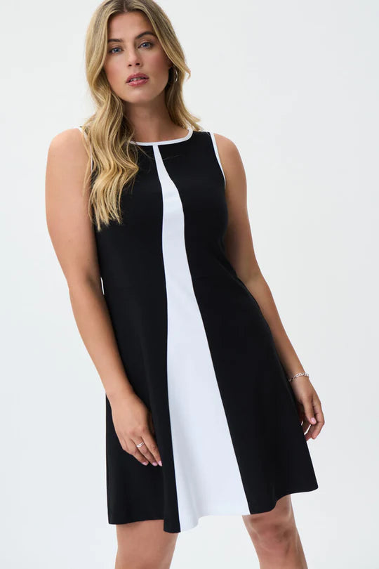 Cette robe sans manches de Joseph Ribkoff à fermeture éclair dans le dos , elle possède un imprimé blanc à l'avant . Elle sera parfaite pour les chaudes journées d’été. Fait de 95% Polyester, 5% Spandex.